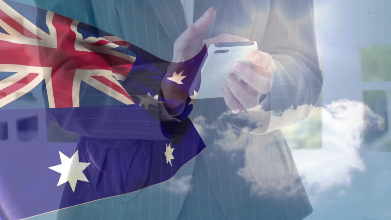 Person using smartphone with Australian flag overlay, cloudy sky in background
