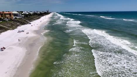 Seaside-Flordia-aerial-push-into-waves-along-surf