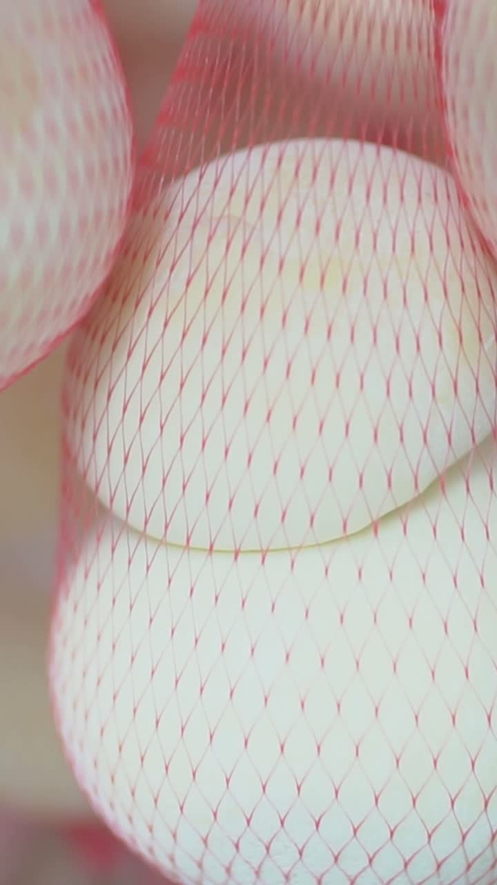 Stacked Cheese in Net Bags