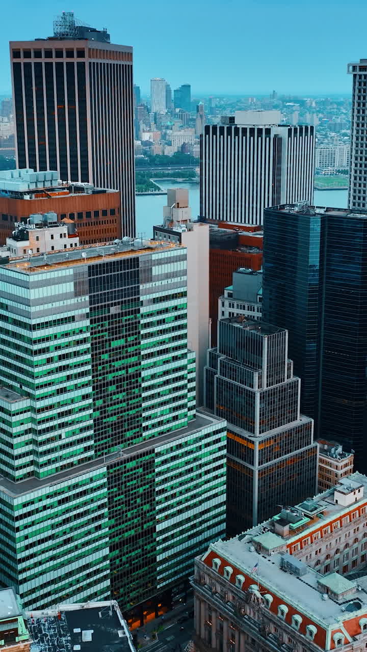 Evening view of the gorgeous architecture of New York. Drone footage slowly approaching skyscrapers.