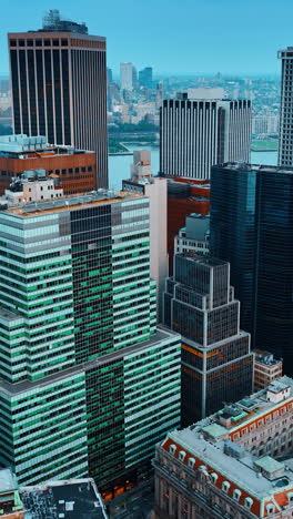 evening view of the gorgeous architecture of new york. drone footage slowly approaching skyscrapers.