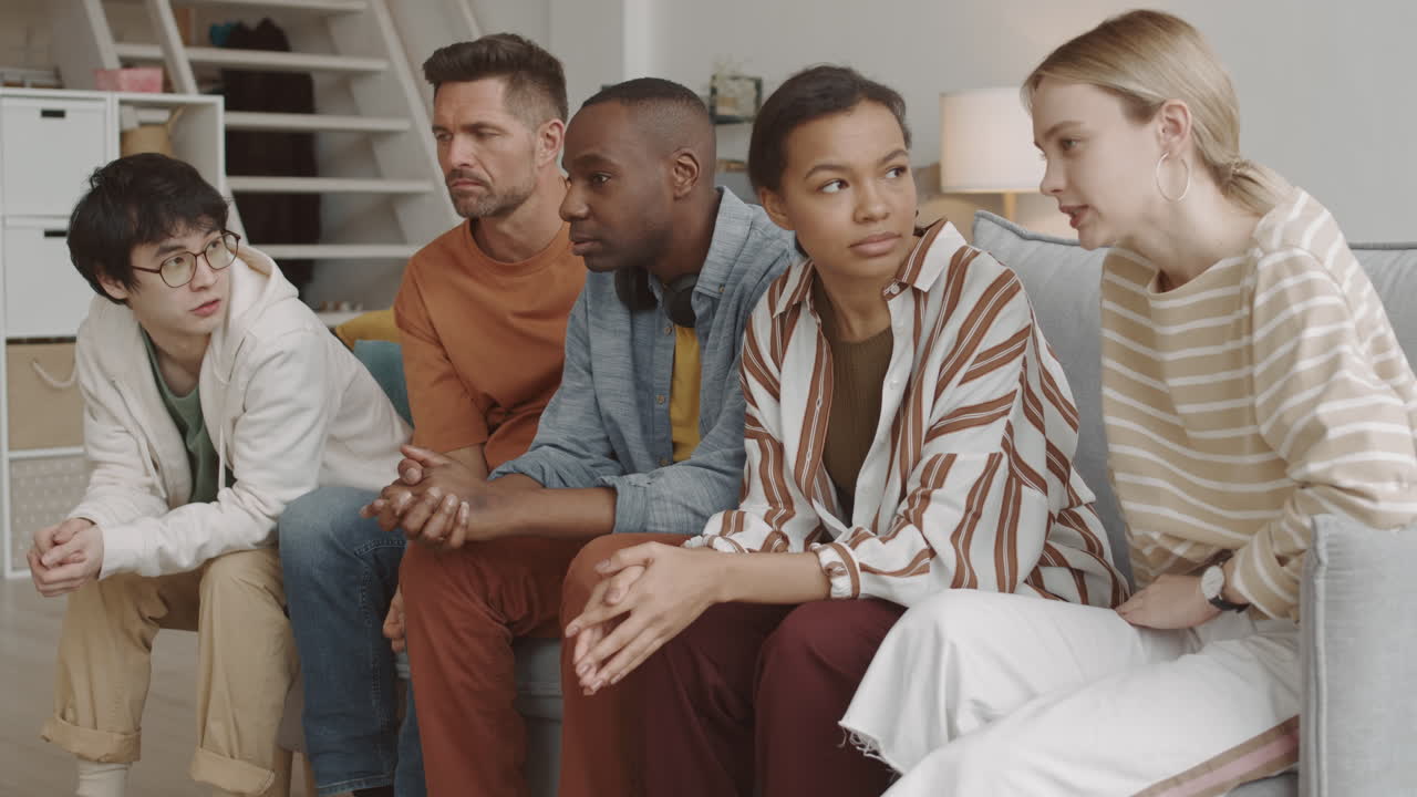 Multiethnic Friends Talking on Couch