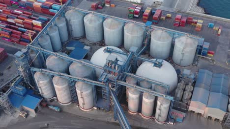 aerial view oil terminal is industrial facility for storage of oil and petrochemical products ready for transport to further storage facilities.