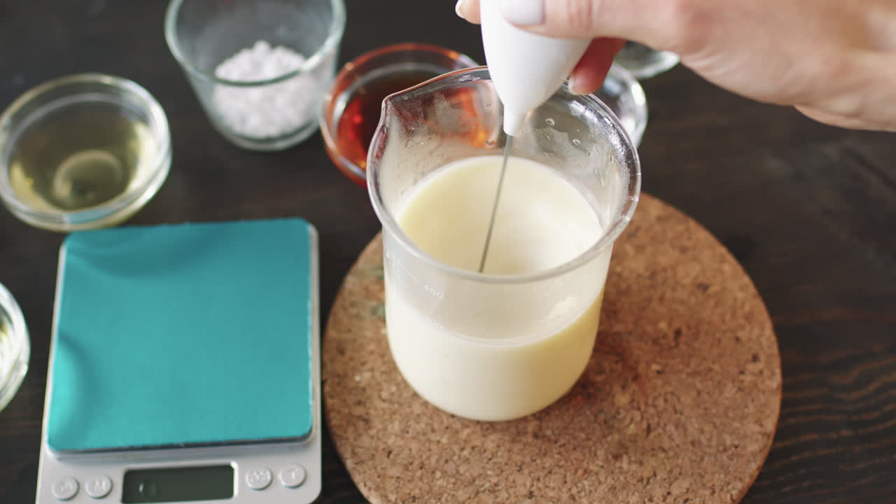 Mixing Ingredients For Handmade Shea Butter Lotion