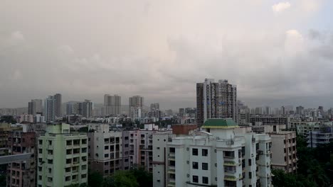 rain clouds over the beautiful city of mumbai in india - wide