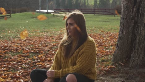 Adult-girl-is-meditating-and-relaxing-in-slow-motion-in-Autumn-scenery