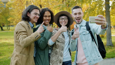 friends taking a selfie in an autumn park