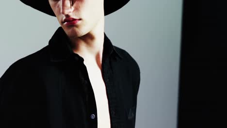 androgynous man posing in studio