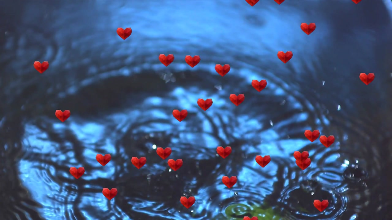 Lime falling into blue pool, impacting water, creating ripples while red hearts overlaying for ads
