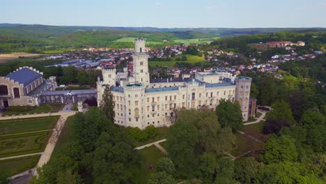 Great-aerial-top-view-flight-Hluboká-Nad-Vltavou-is-a-Fairy-tale-castle-in-Czech-Republic-Europe,-summer-day-2023