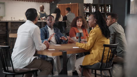 diverse group meeting in a cafe