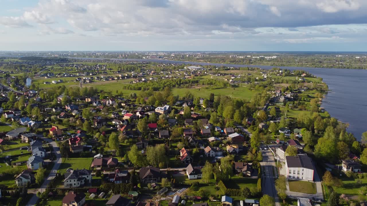 Katlakalns, Latvia: Springtime Aerial of Houses, Green Landscape and River