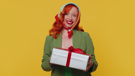 Redhead-ginger-girl-presenting-birthday-gift-box-offer-wrapped-present-career-bonus-celebrating