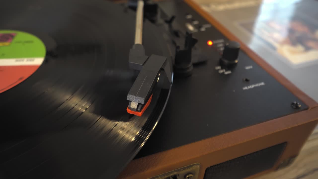 Vinyl record player . black vinyl record is spinning on turntable.