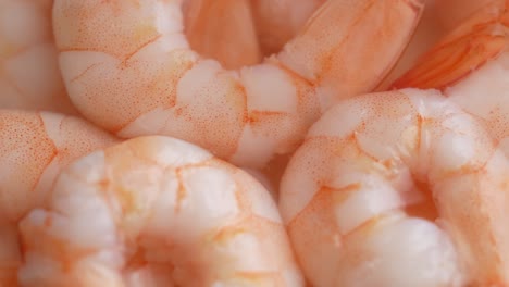 juicy delicious peeled shrimp in sauce, close-up rotate