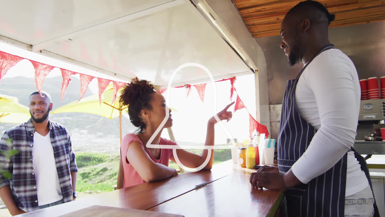 People interacting at outdoor food truck with notification bell animation overlay