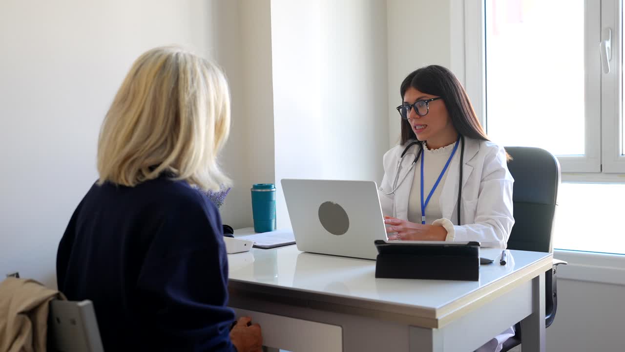 Doctor Consults with Patient in Office Setting | Premium Stock Video ...