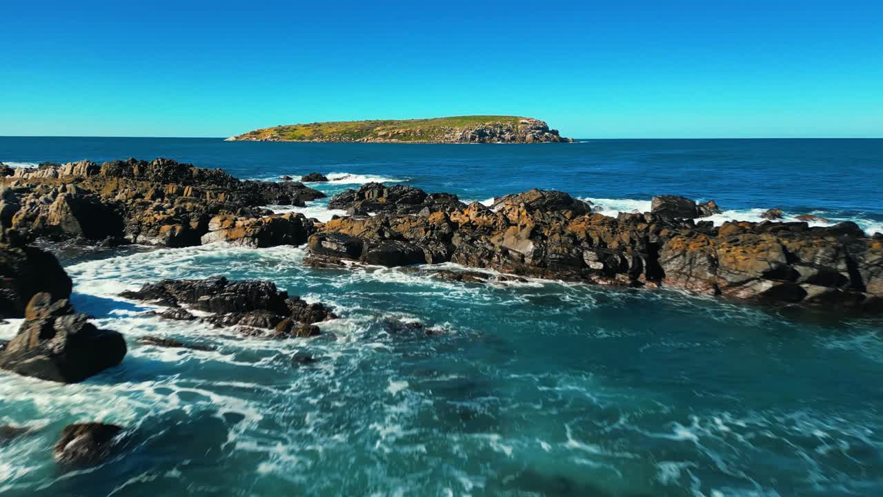 Aerial view of seascape along the vast beach on the South Coast during summer