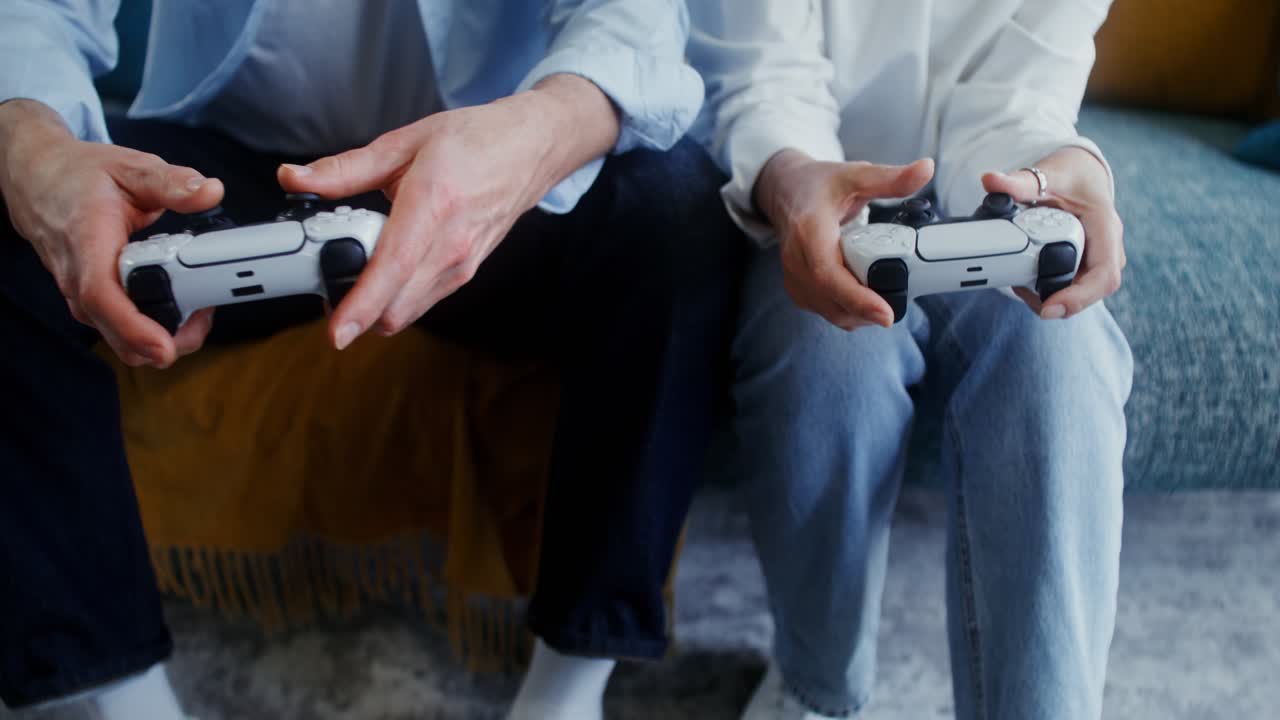 People playing video games at home