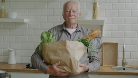 senior man with grocery bag
