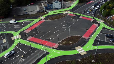 Aerial-view-looking-down-at-vehicles-travelling-on-St-Helens-CYCLOPS-traffic-optimisation-junction-crossroad-intersection