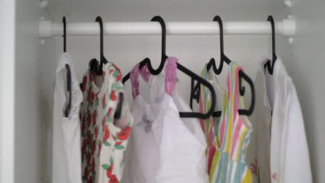 baby girl clothes in wardrobe