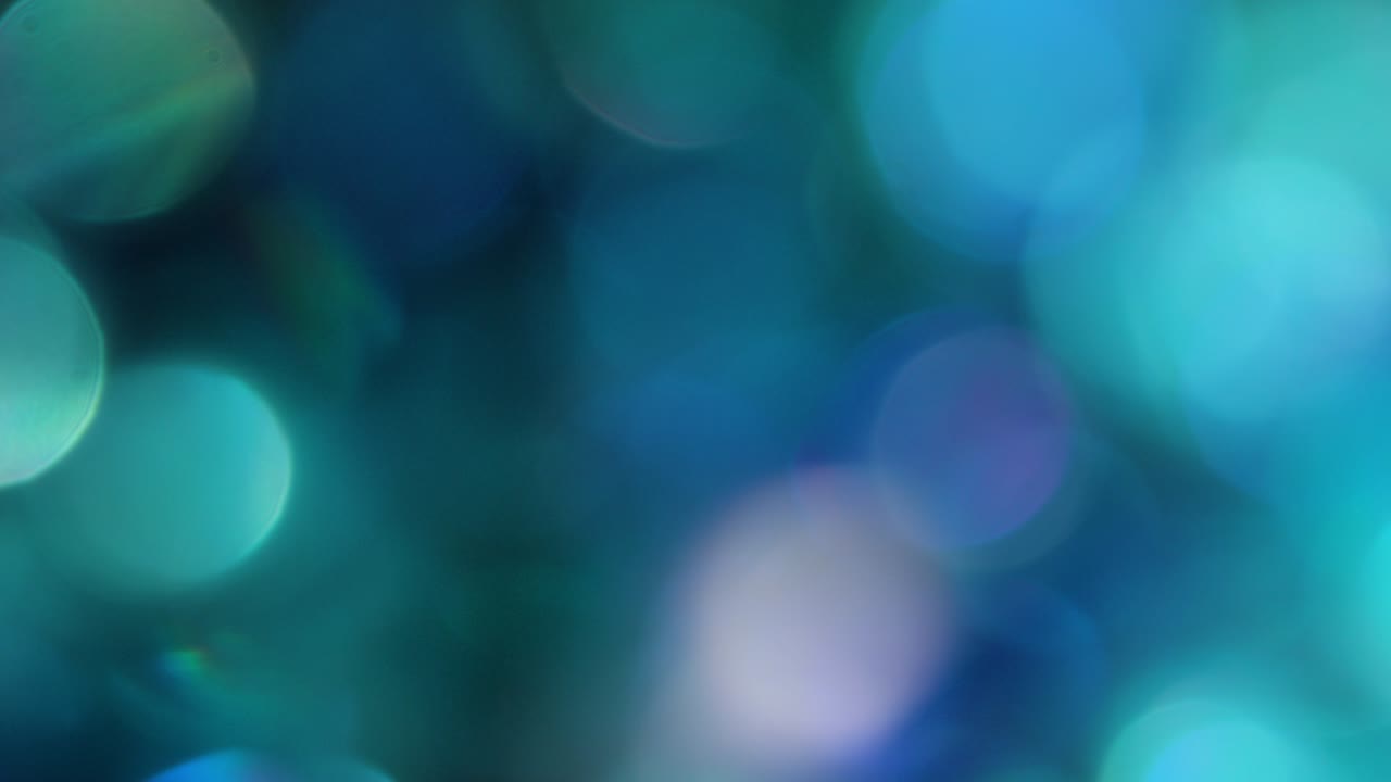 la rotación de los círculos bokeh en el sentido de las agujas del reloj