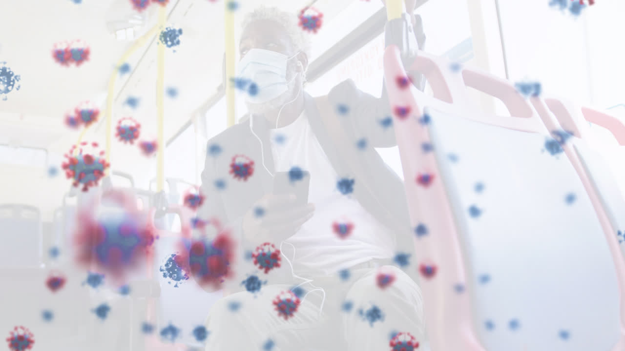 코로나19 세포가 얼굴 마스크를 착용한 백인 남성 위에 떨어지는 애니메이션