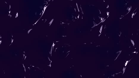 Closeup-fantasy-chaos-purple-liquid-waves-in-dark-space
