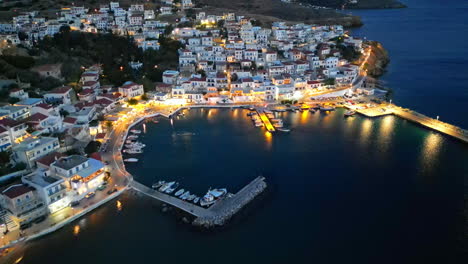 dusk aerial view of batsi, a traditional village at the island of andros, cyclades, greece