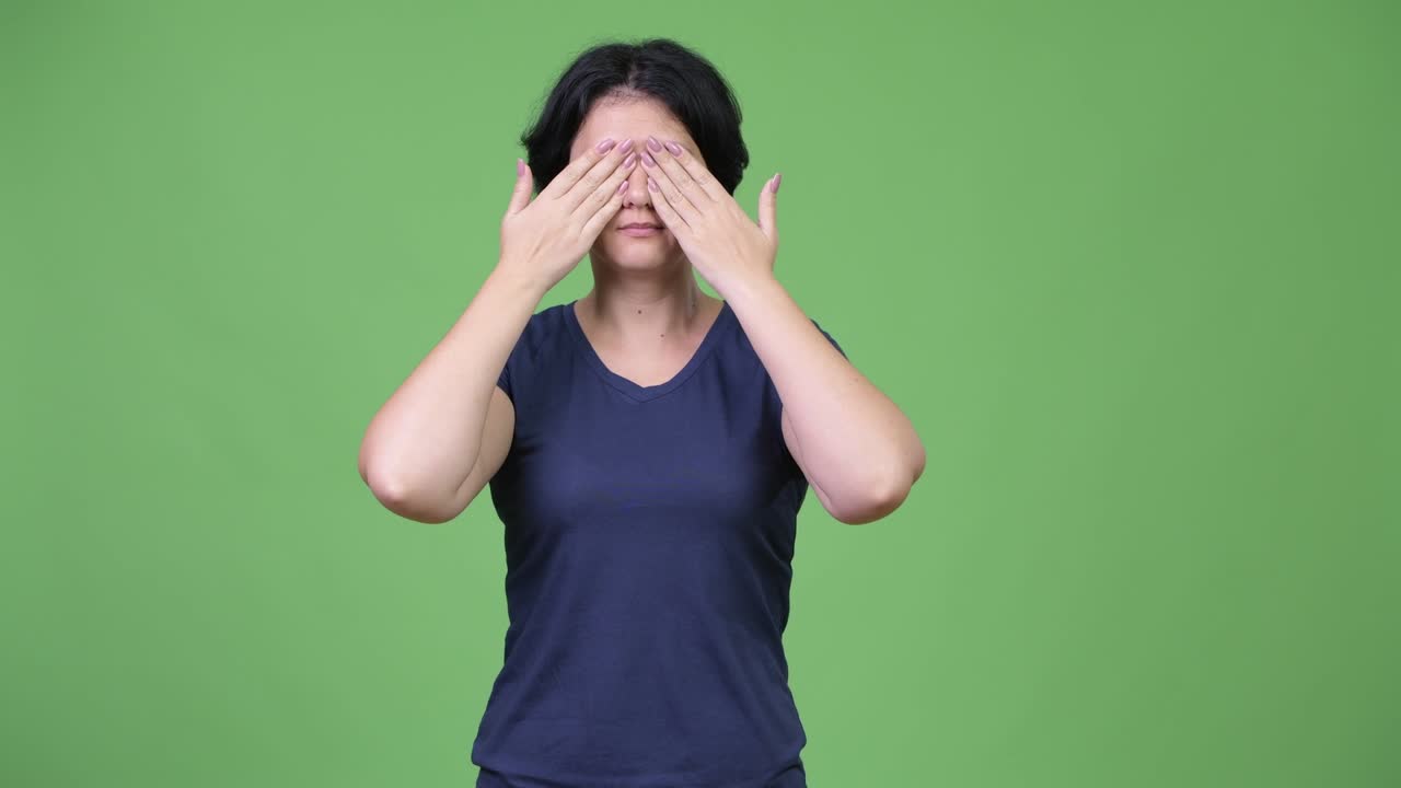 Beautiful woman covering eyes as three wise monkeys concept