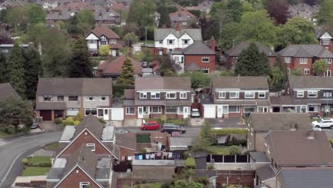 quiet british homes and gardens residential suburban property aerial view