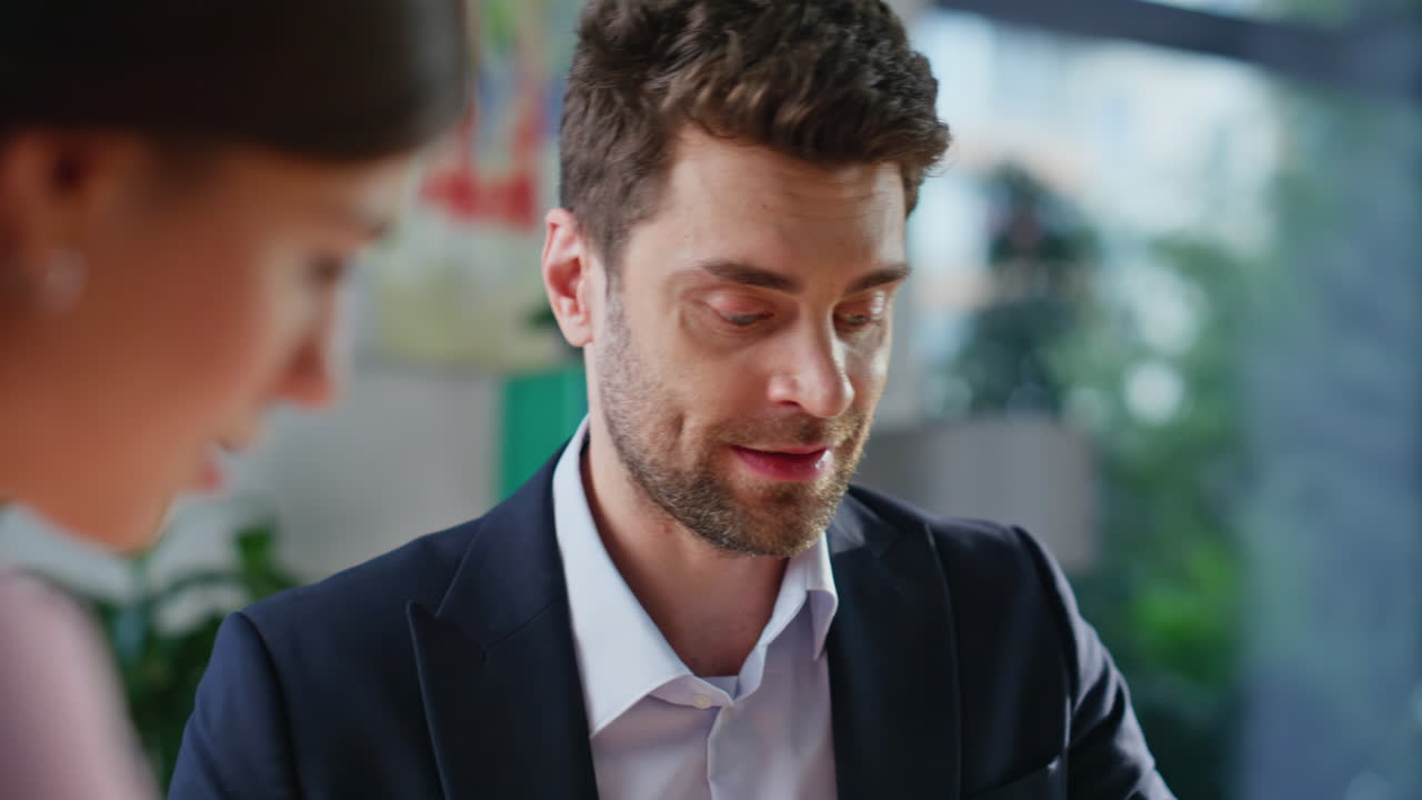 Professional lawyer consulting client at office closeup. Smiling businessman