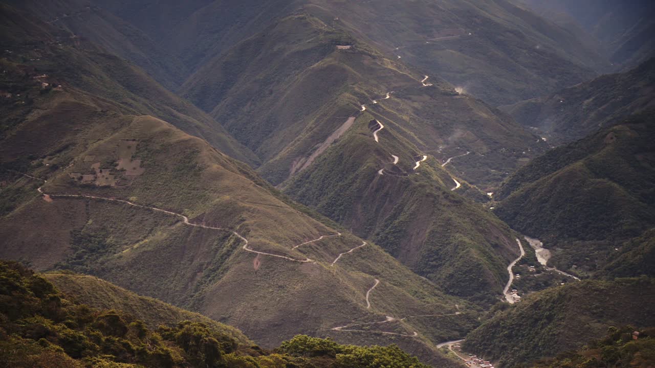 View from above of the Death Road, Bolivia, surrounded by mountain forests