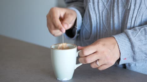 woman preparing tea