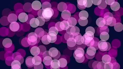 an artistic composition showcasing glowing purple circles arranged in a circular pattern on a dark background. the soft, rounded edges create a luminous and dynamic visual impact