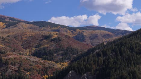 Drone-70mm-push-in-shot-of-autumn-Aspen-mountains