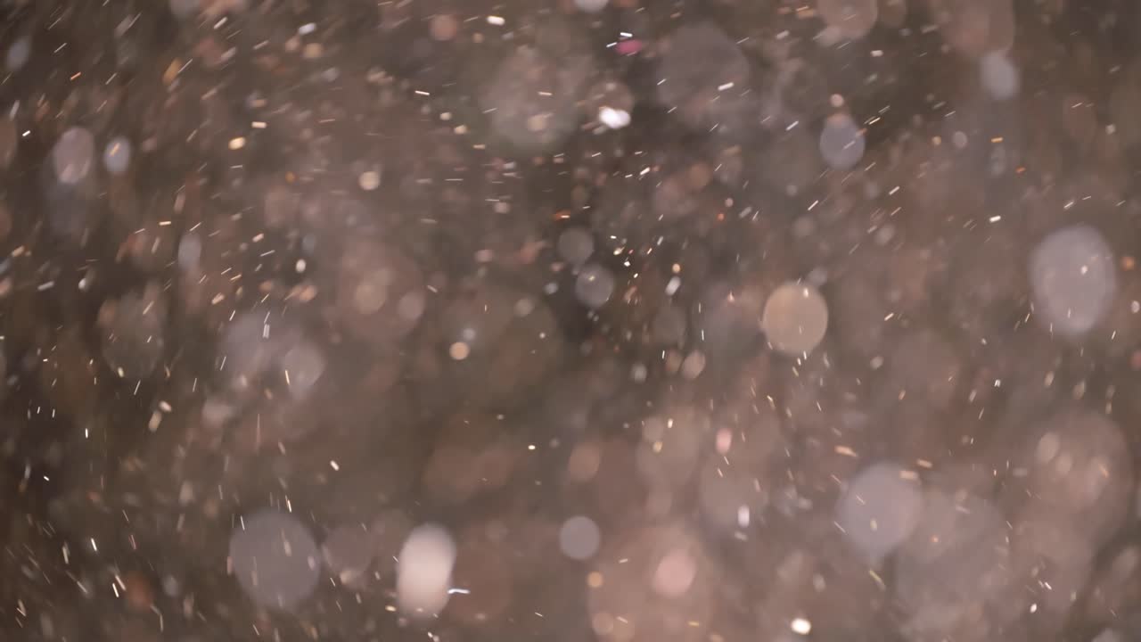 bokeh de partículas abstractas flotantes sobre fondo oscuro