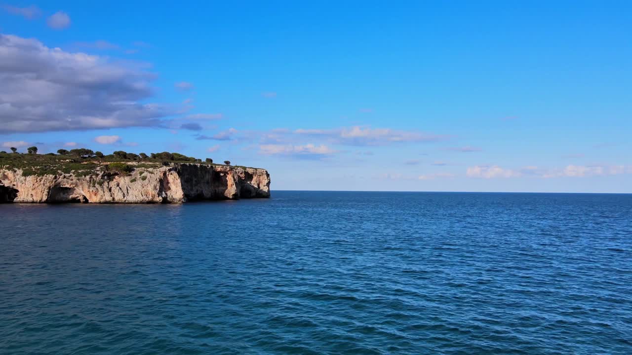 Experience the serene beauty of Cala Varques in Porto Cristo, Majorca. The tranquil waters and stunning cliffs offer a perfect escape for relaxation and exploration.