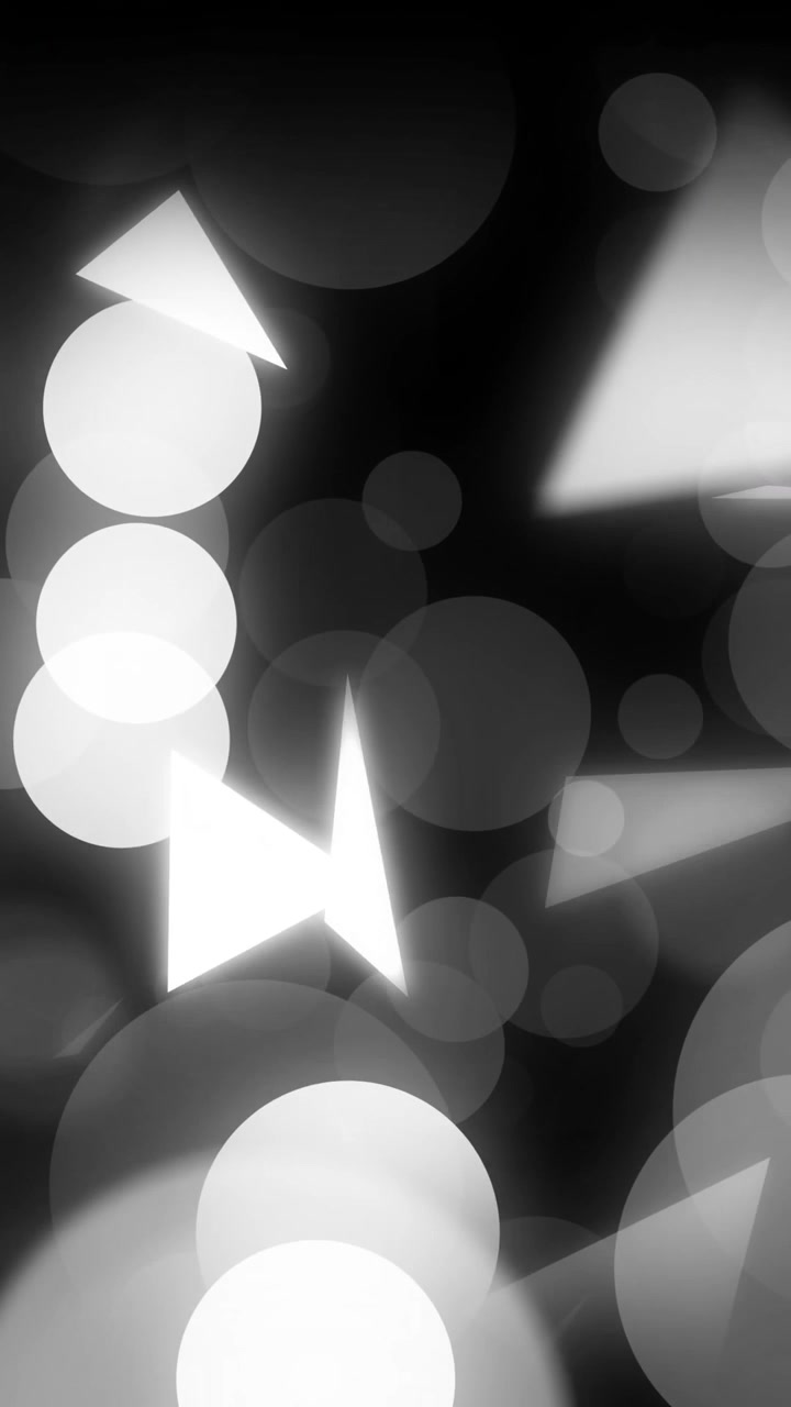 Animation of light spots and shapes on black background