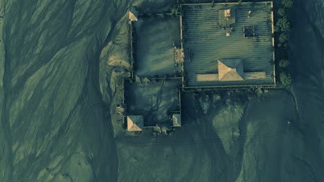 aerial view of hindu temple at the foot of mount bromo crater, indonesia