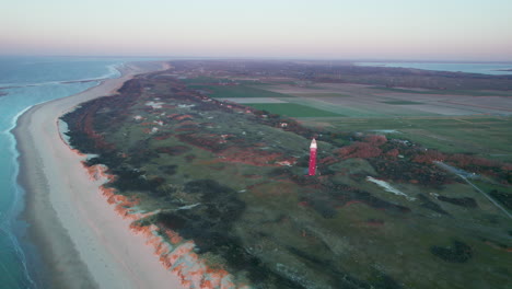 Westhoofd-Lighthouse-With-Sand-Dune-Landscape-In-The-Netherlands,-Ouddorp,-Zeeland