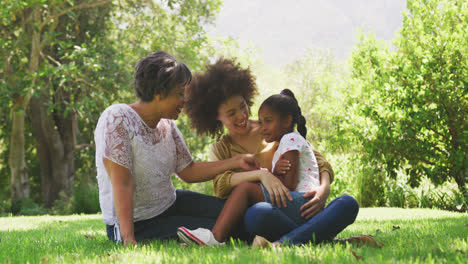 mixed race woman spending time with her mother and her daughter
