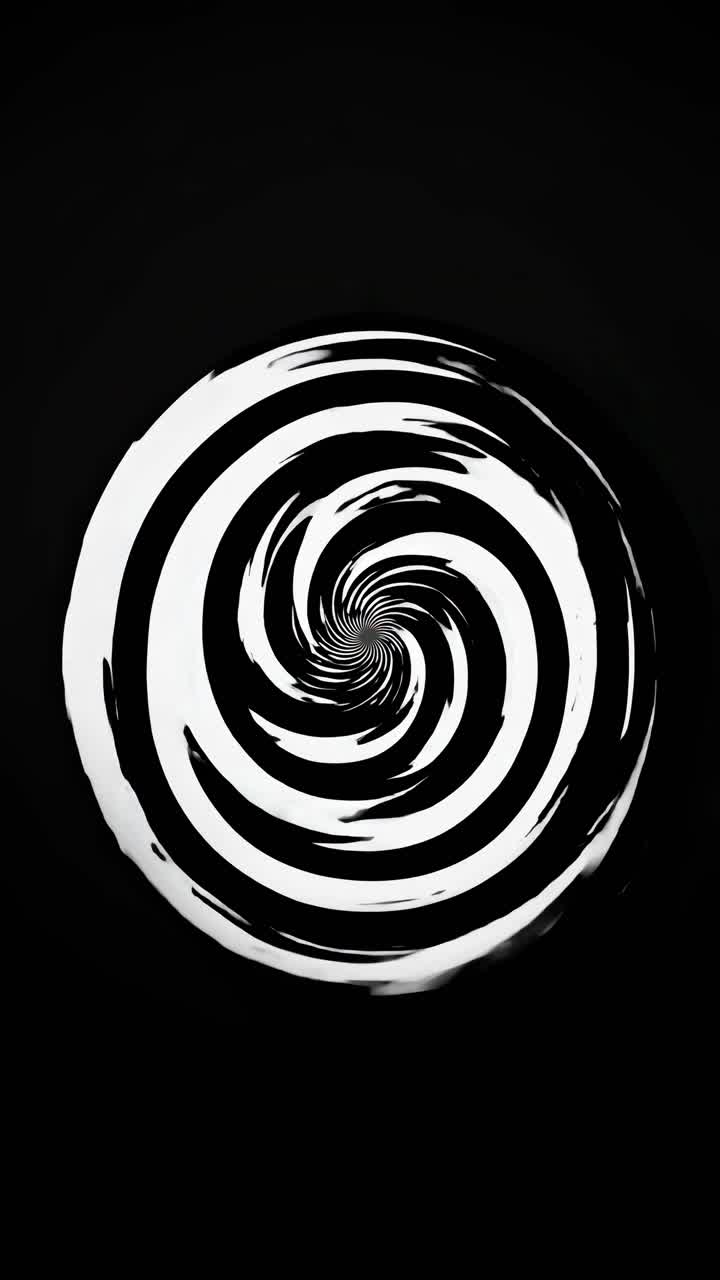 Vista dall'alto di una spirale ipnotica in bianco e nero, che crea un effetto vertiginoso, che ricorda