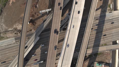 Birdseye-view-of-cars-on-59-and-610-South-Freeway-in-Houston,-Texas