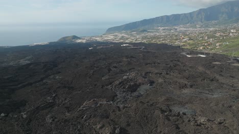 dark basalt rock field from new volcanic eruption on la palma island