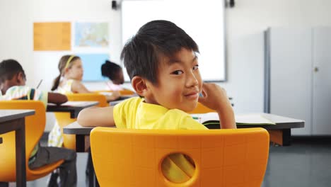 school kids studying in classroom