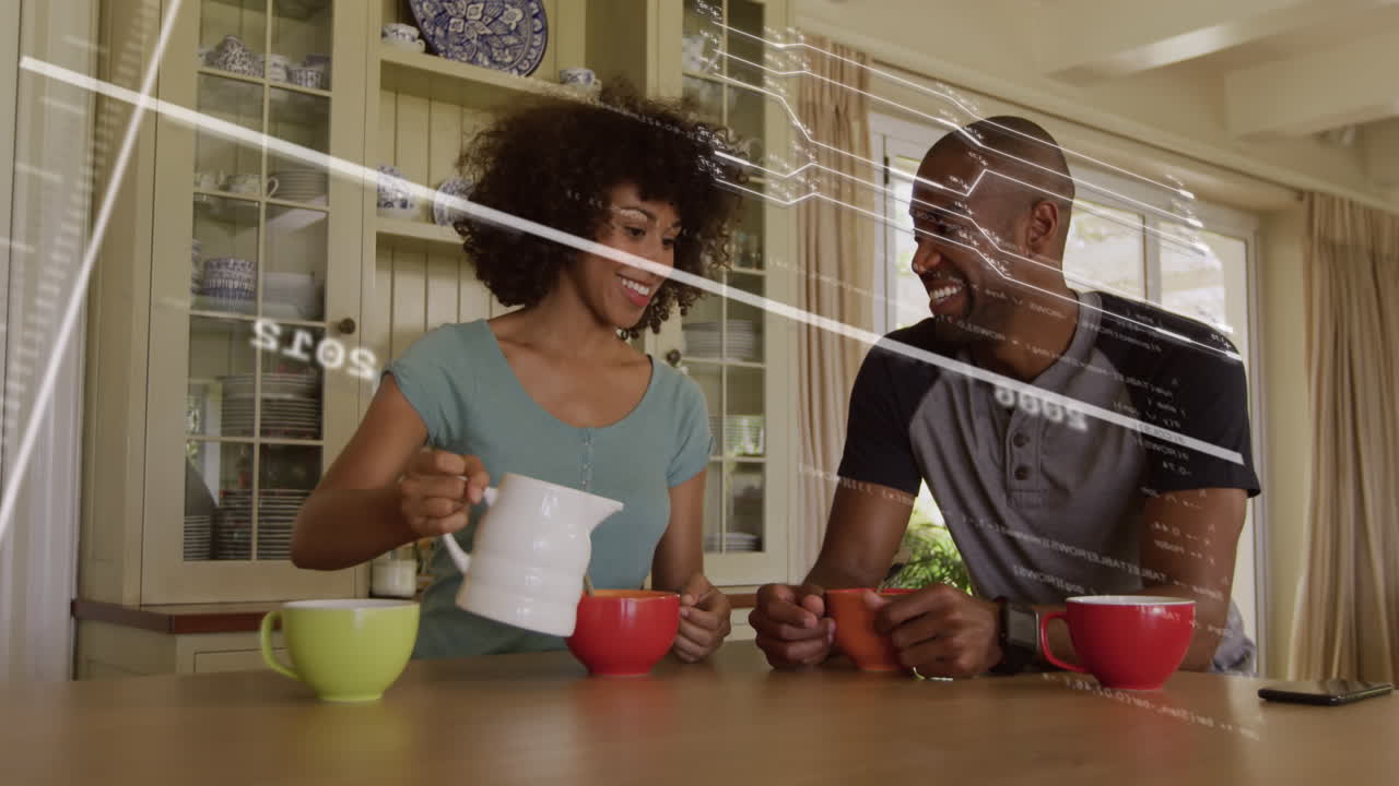 Animation of lines, changing numbers, circuit board pattern, african american couple drinking tea