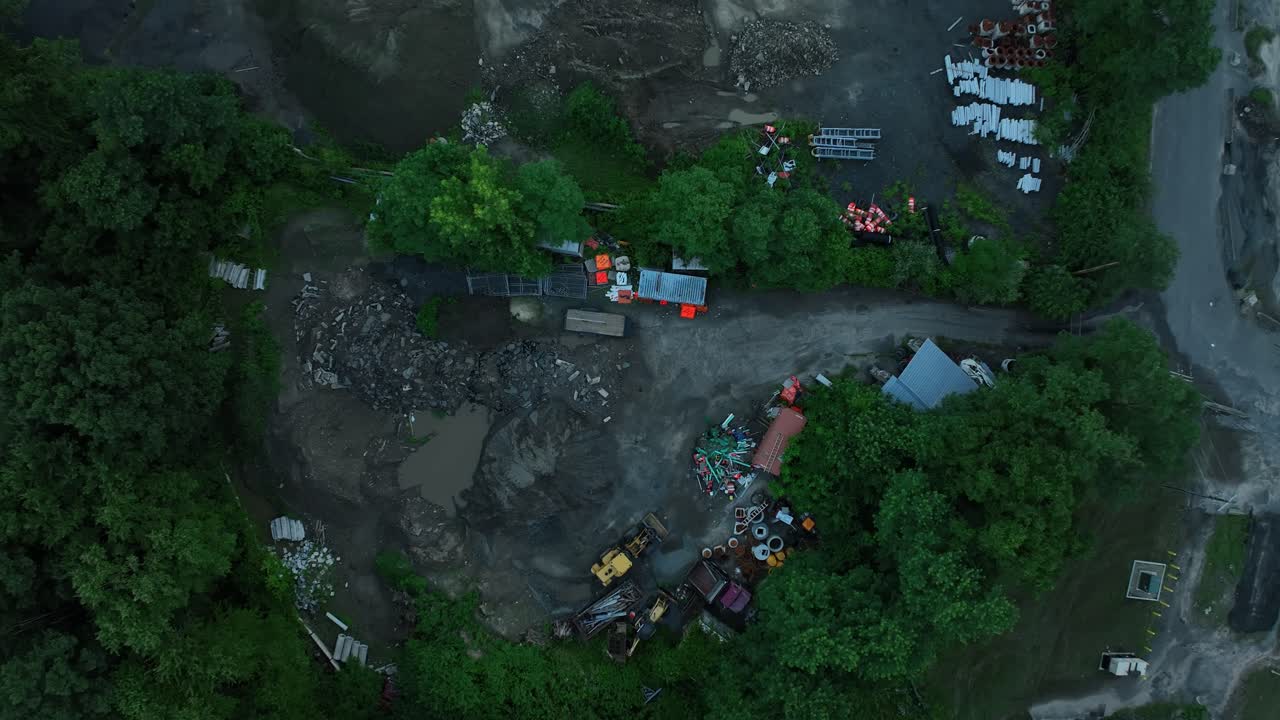 Aerial View of an Industrial Scrapyard and Construction Area