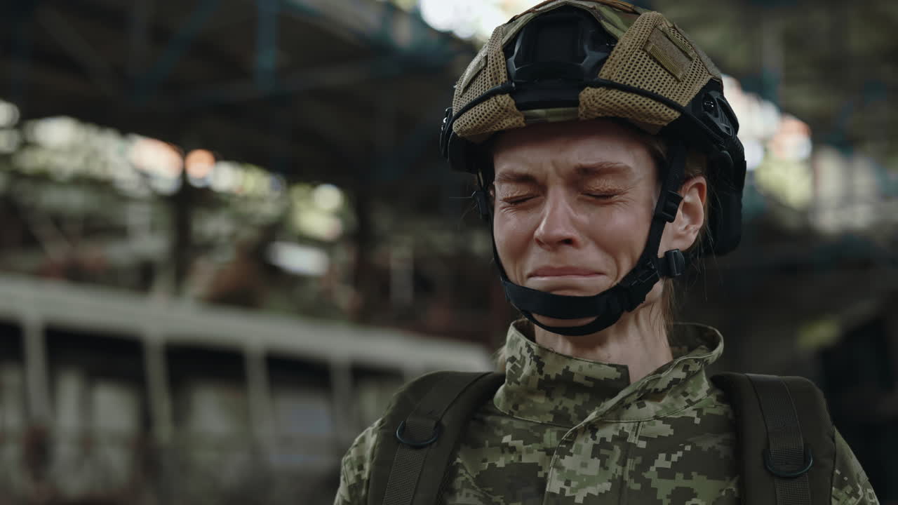 A Soldier's Tearful Moment in a War-Torn Area